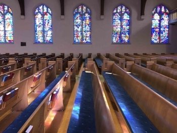 The Evolution and Significance of Pews in Church Architecture image